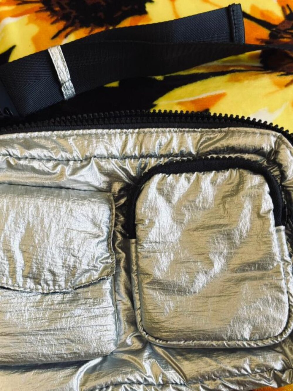 Silver small bag to wear around waist or as cross body bag with adjustable strap